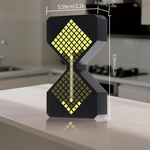 Black electronic hourglass with warm yellow LED pixels on a kitchen counter