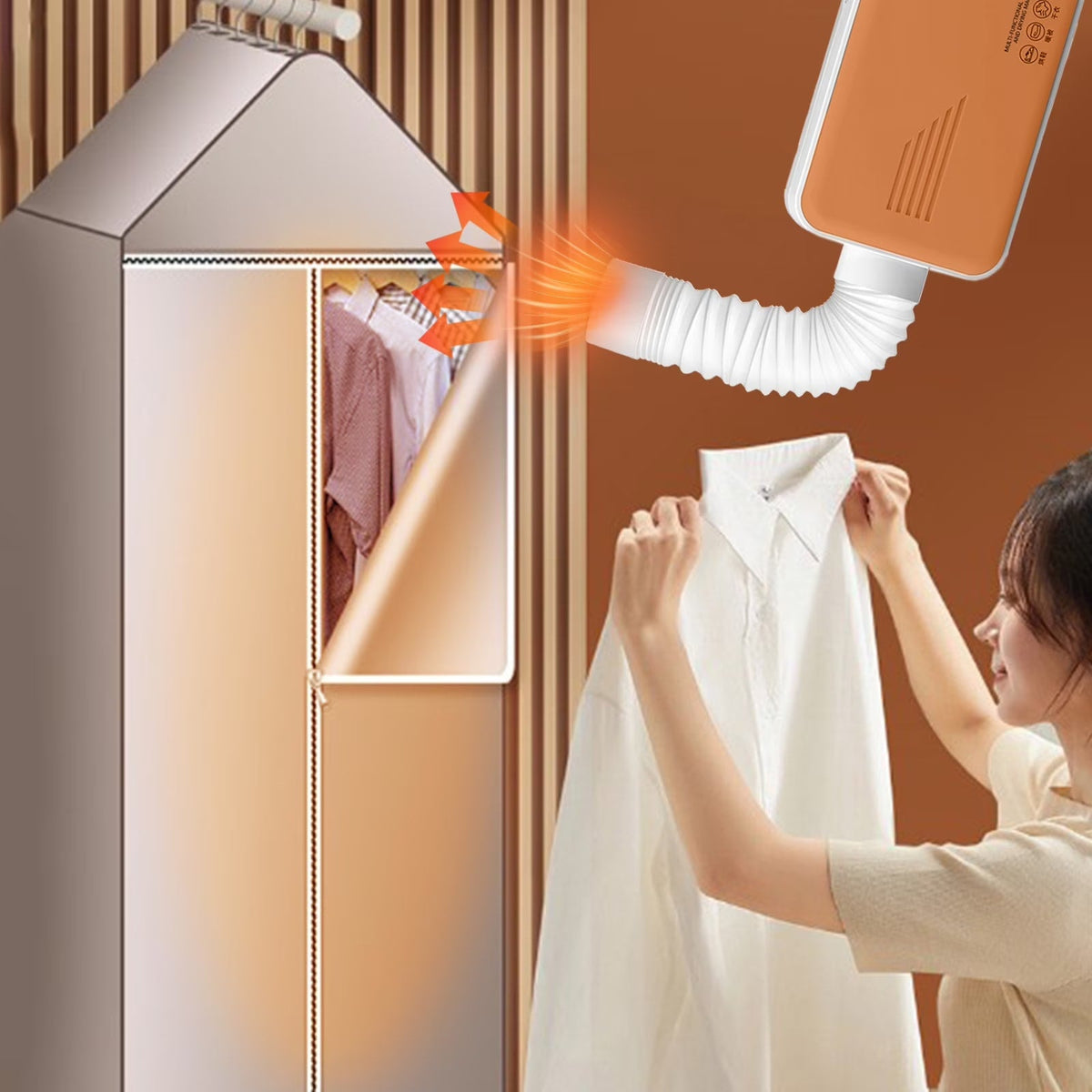 Portable clothes dryer blowing warm air into a cover full of shirts