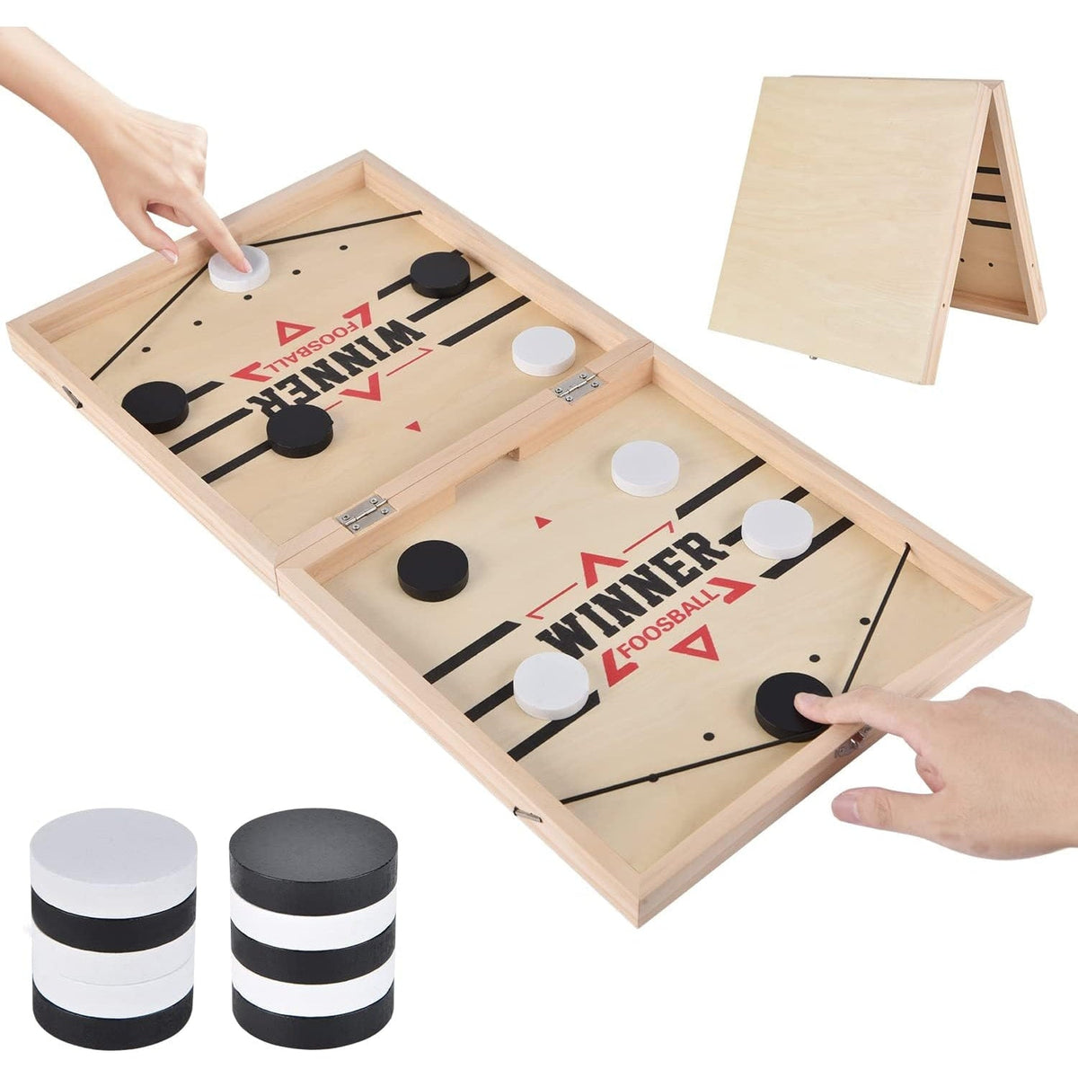 Foldable wooden slingshot table game with black and white pucks